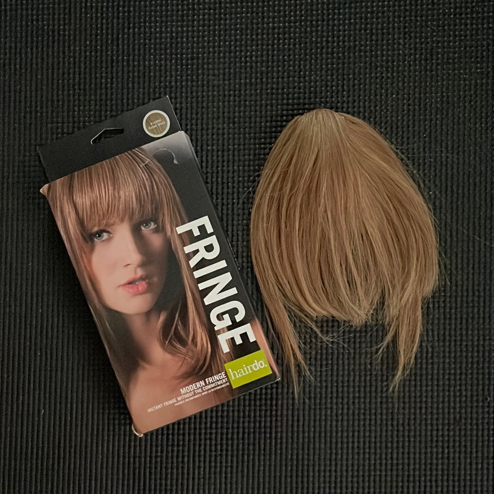 Fringe hair clip. Never worn/ holds well/ wheat blonde